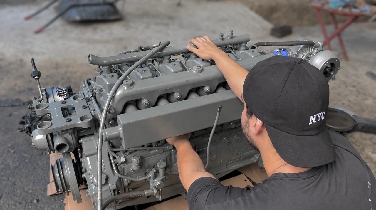 Joubert Júnior trabalhando na montagem de motor diesel